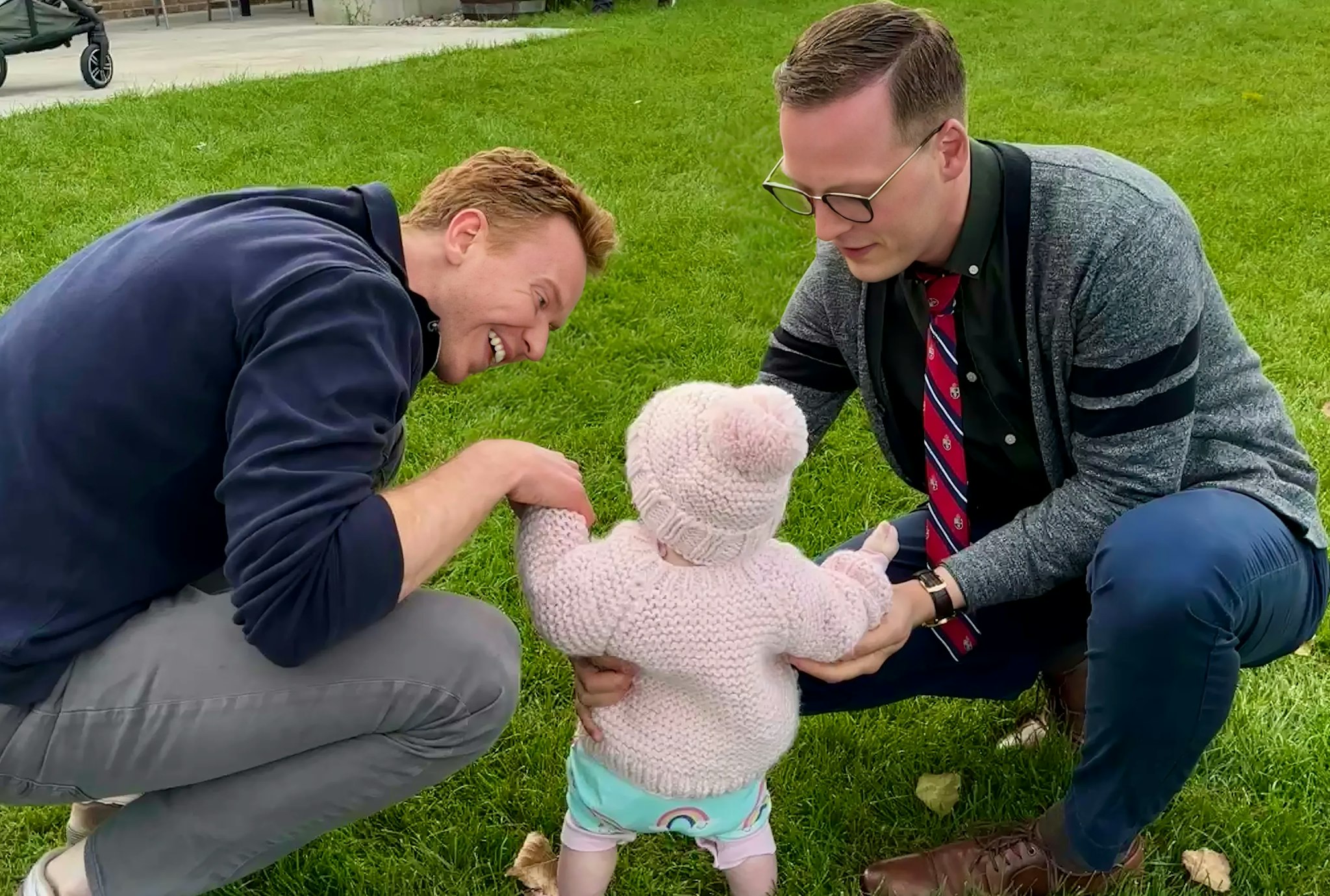 Jake with his family in a park.